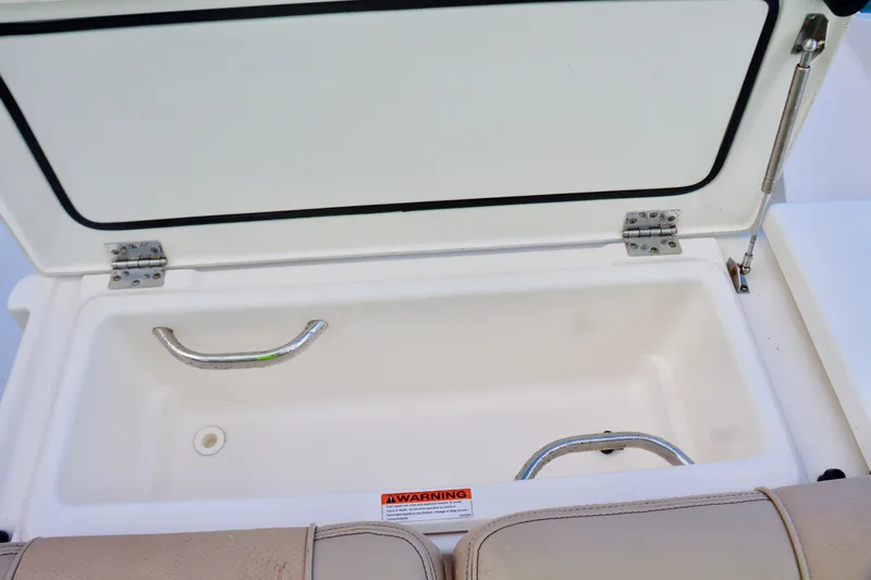  Yacht Photos Pics Open storage compartment on 2017 Pursuit DC 295 Dual Console boat.
