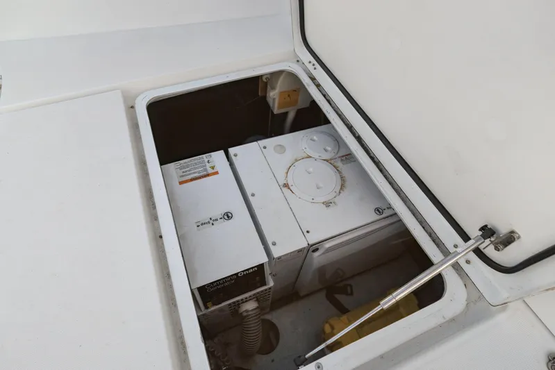 Benedetto Yacht Photos Pics Engine compartment of a 2020 Lagoon 42 catamaran with Cummins Onan generator.