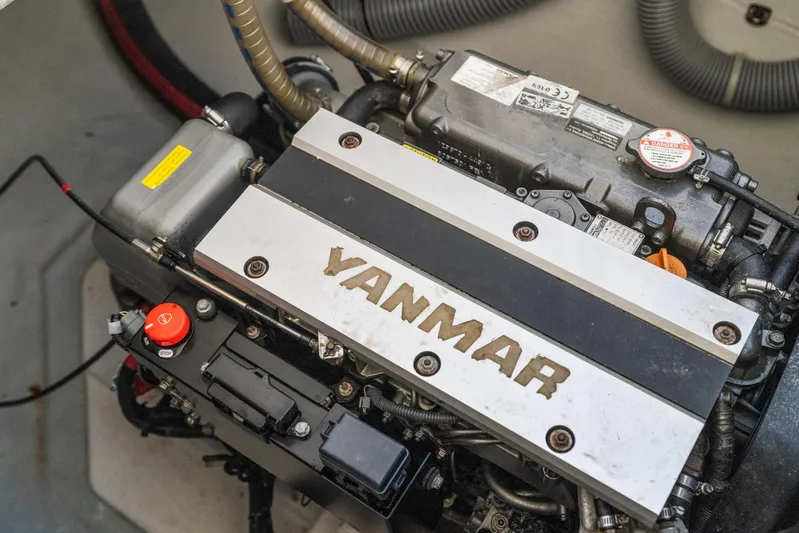 Benedetto Yacht Photos Pics Yanmar engine in a 2020 Lagoon 42 catamaran, showcasing mechanical components.