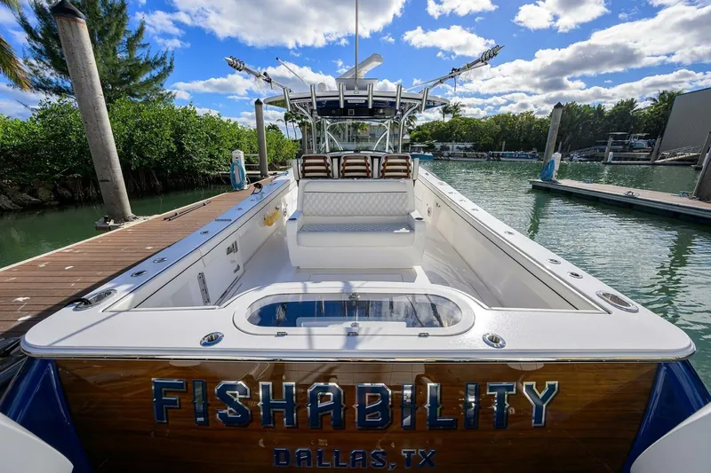 Fishability Yacht Photos Pics 2025 Valhalla Boatworks V-41 docked, featuring spacious deck and sleek design.