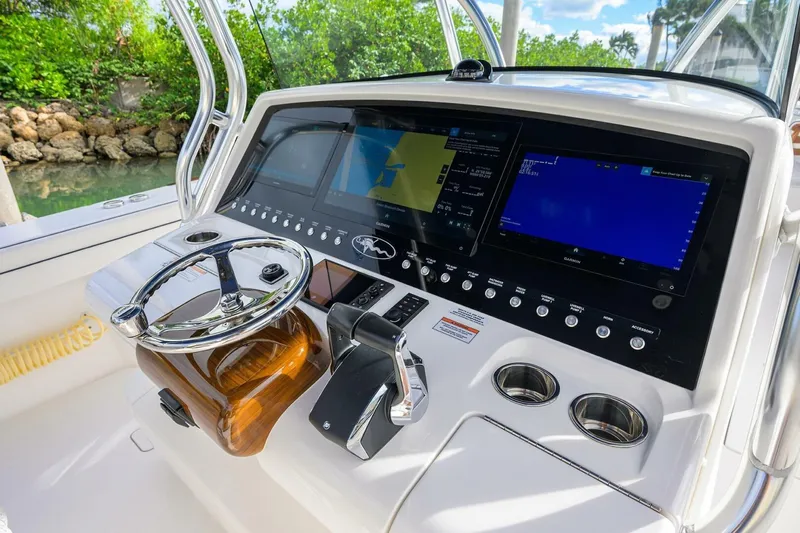 Fishability Yacht Photos Pics 2025 Valhalla Boatworks V-41 helm with advanced navigation displays and controls.