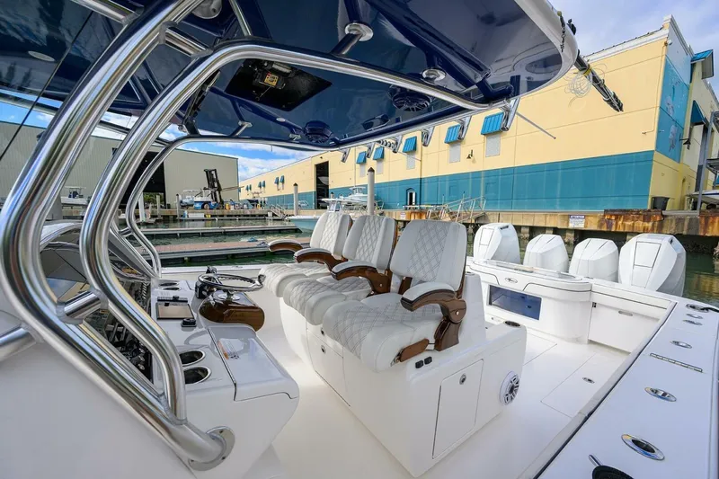 Fishability Yacht Photos Pics 2025 Valhalla Boatworks V-41 luxury boat interior with sleek seating and advanced controls.