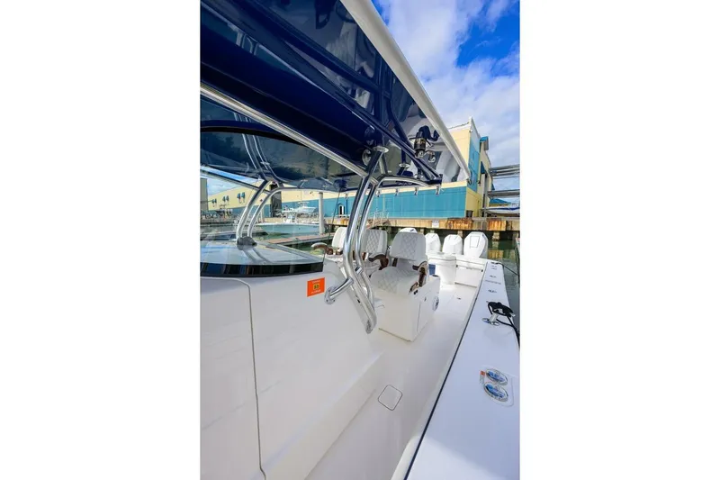 Fishability Yacht Photos Pics 2025 Valhalla Boatworks V-41, sleek interior view with modern seating and canopy.