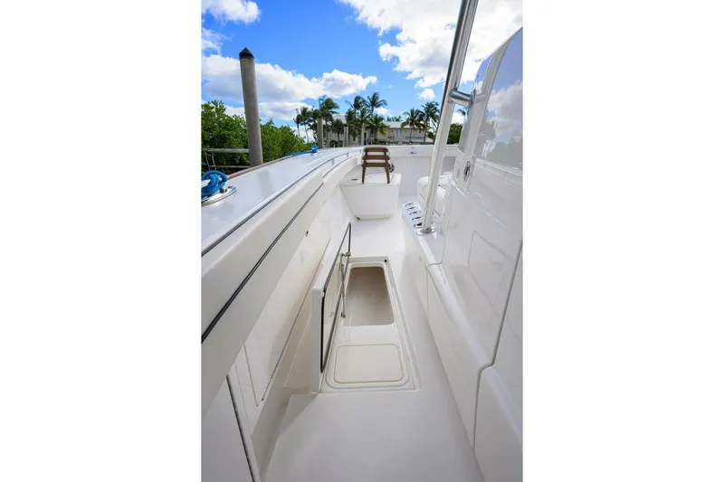 Fishability Yacht Photos Pics 2025 Valhalla Boatworks V-41 deck view with open storage compartment.