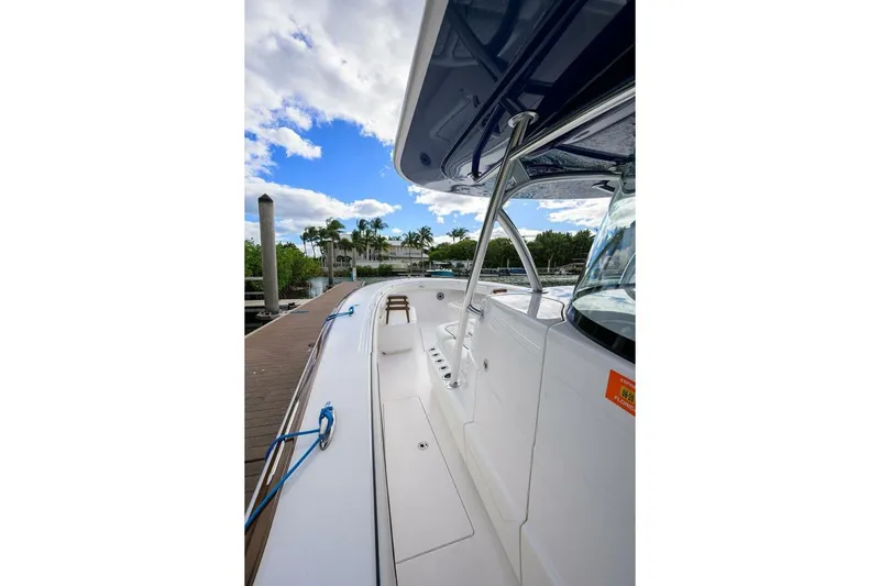 Fishability Yacht Photos Pics 2025 Valhalla Boatworks V-41 docked, showcasing sleek design and spacious deck.
