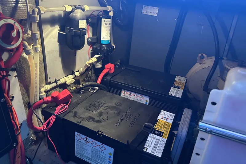  Yacht Photos Pics Engine room of 1999 Silverton 442 Cockpit Motor Yacht with batteries and wiring.