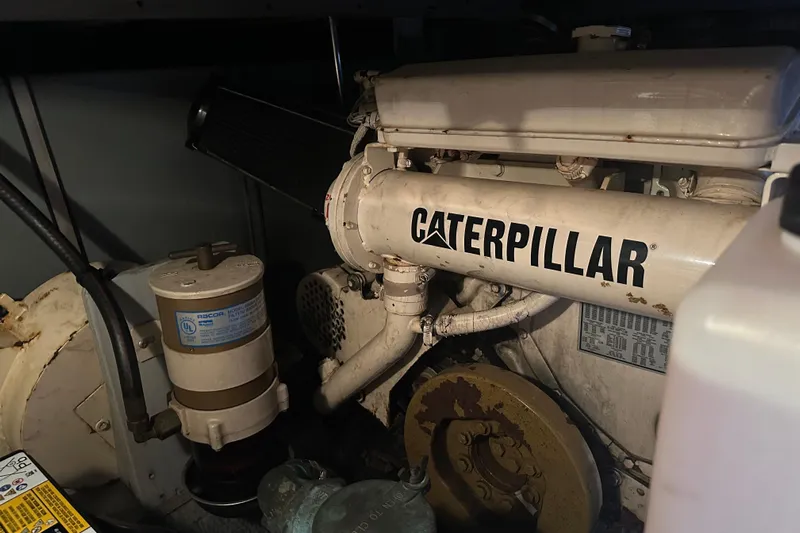  Yacht Photos Pics Engine room of 1999 Silverton 442 Cockpit Motor Yacht with Caterpillar engine.