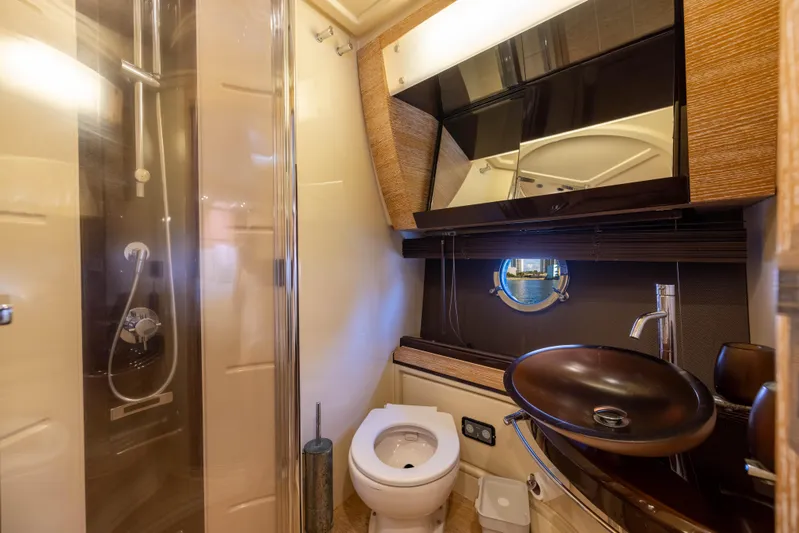 Blue Sea Yacht Photos Pics Luxurious bathroom in 2012 Azimut 53 yacht with modern fixtures and elegant design.