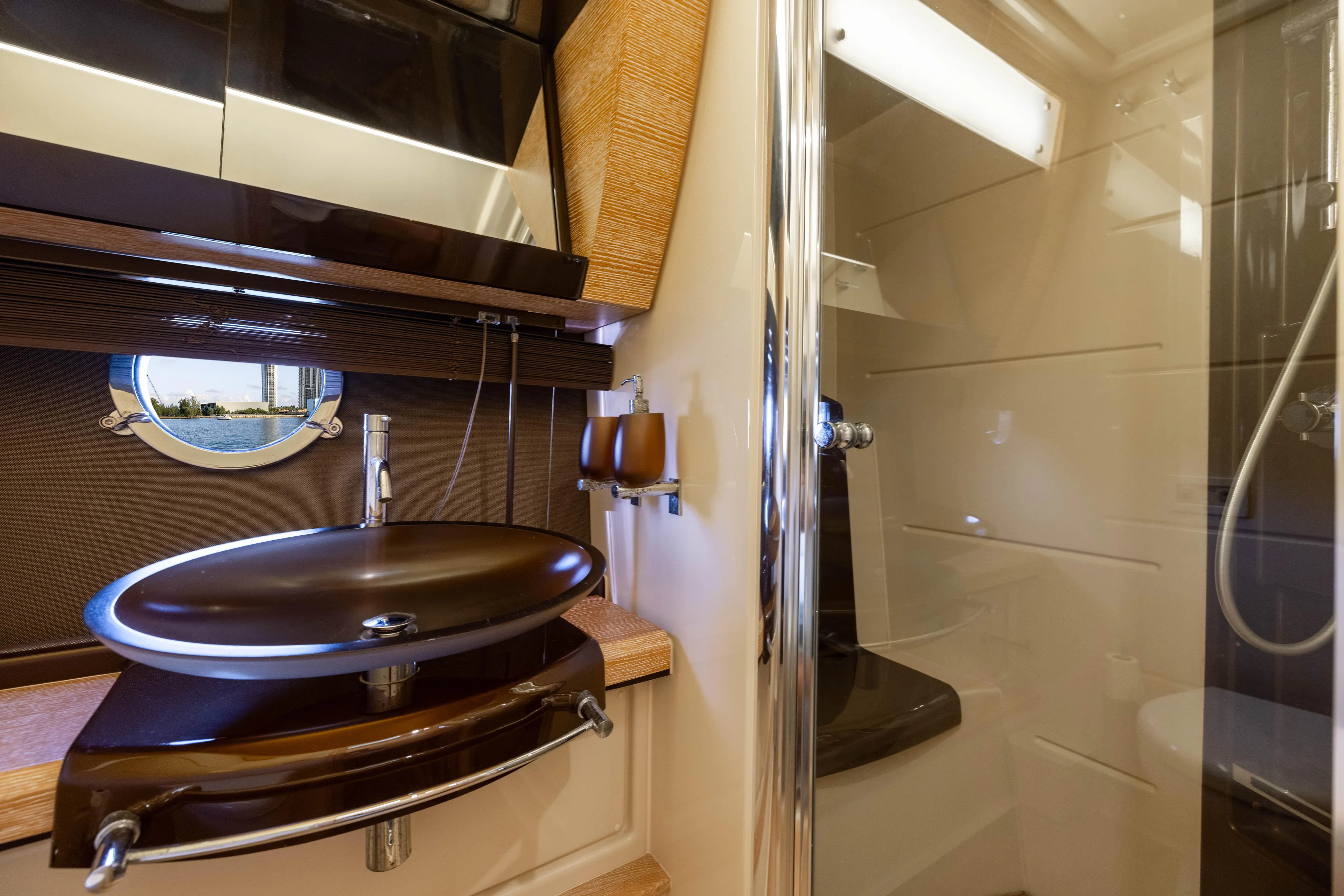 Blue Sea Yacht Photos Pics Luxurious bathroom interior of 2012 Azimut 53 yacht with modern sink and shower.
