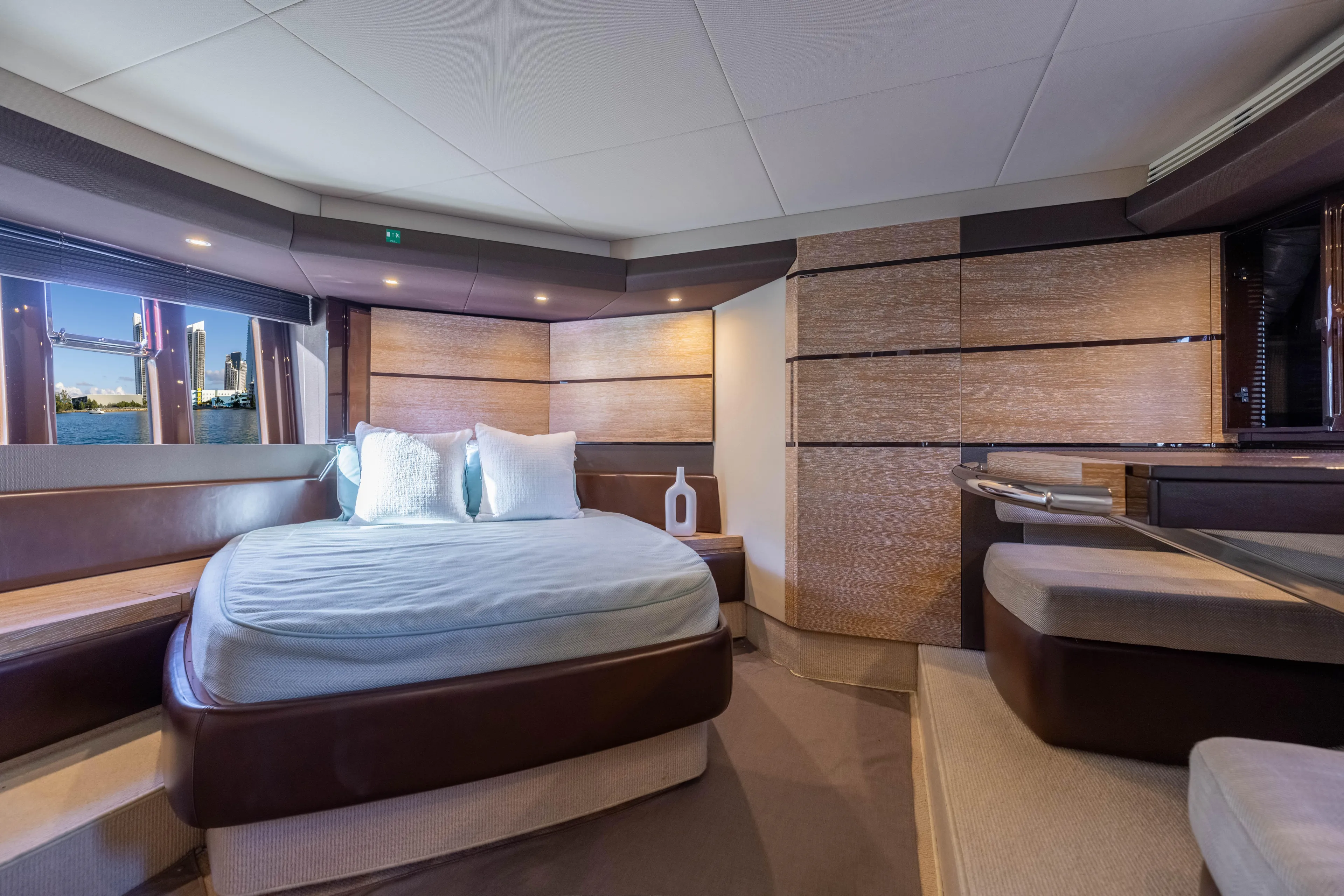 Blue Sea Yacht Photos Pics Luxurious bedroom interior of a 2012 Azimut 53 yacht with modern design elements.