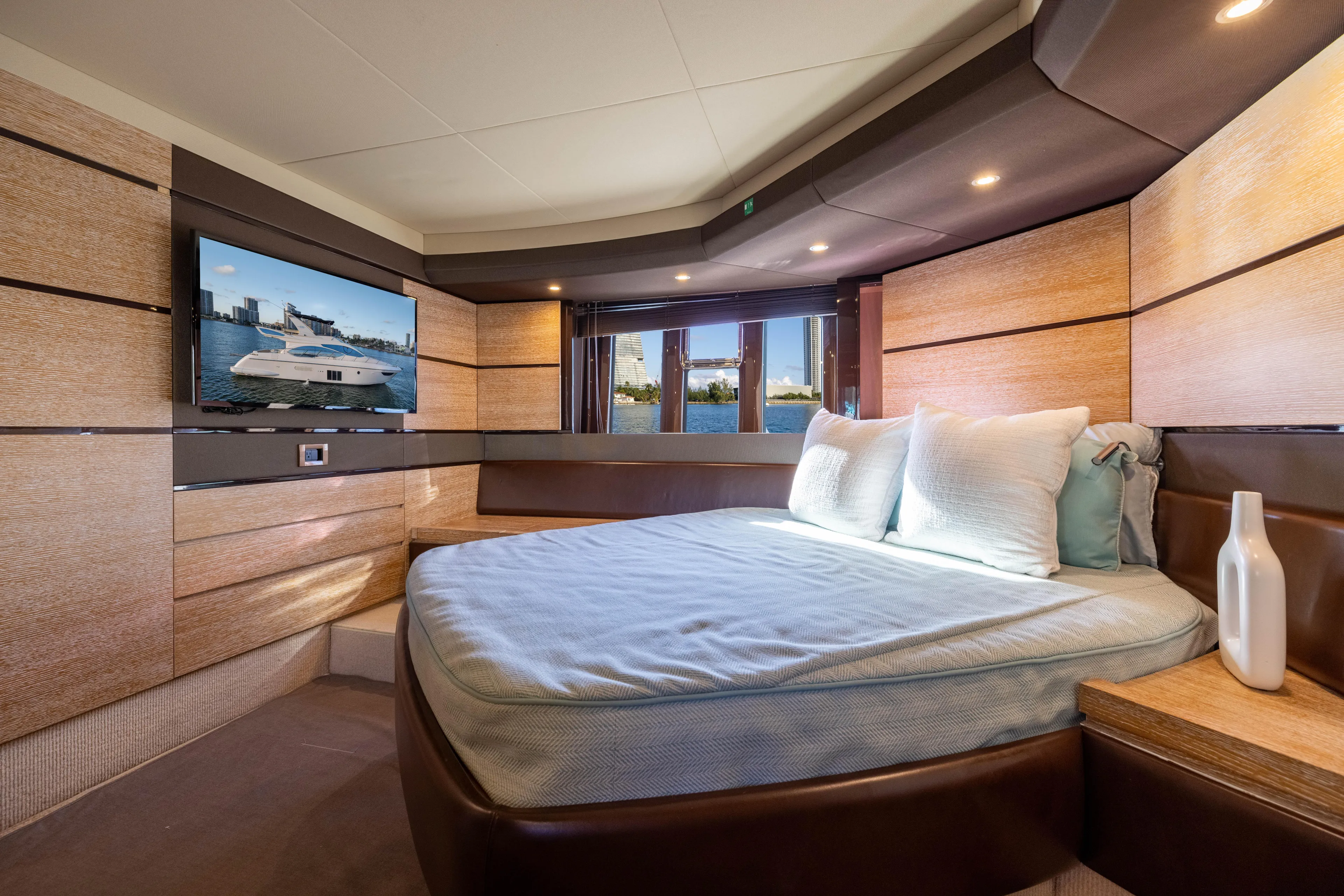 Blue Sea Yacht Photos Pics Luxurious interior of 2012 Azimut 53 yacht with cozy bedroom and modern decor.