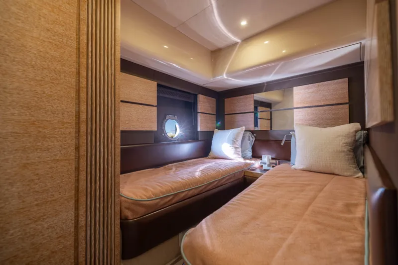 Blue Sea Yacht Photos Pics Luxurious cabin interior of 2012 Azimut 53 yacht with twin beds and elegant decor.