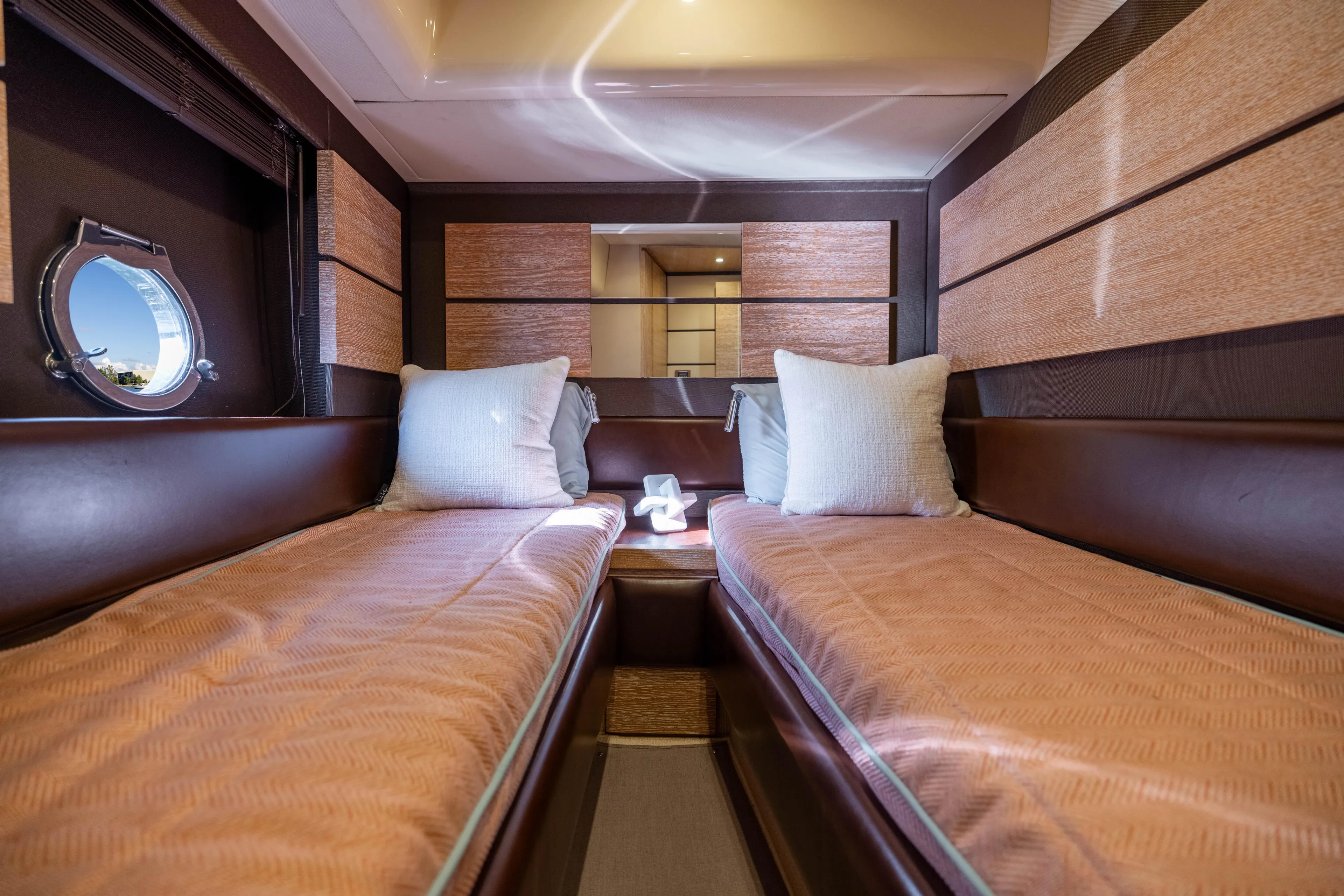 Blue Sea Yacht Photos Pics Luxurious twin cabin interior of 2012 Azimut 53 yacht with elegant bedding and decor.