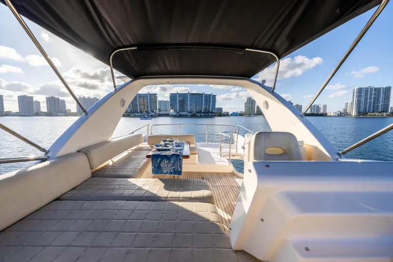 Blue Sea Yacht Photos Pics Luxurious 2012 Azimut 53 yacht with spacious deck, city skyline view.