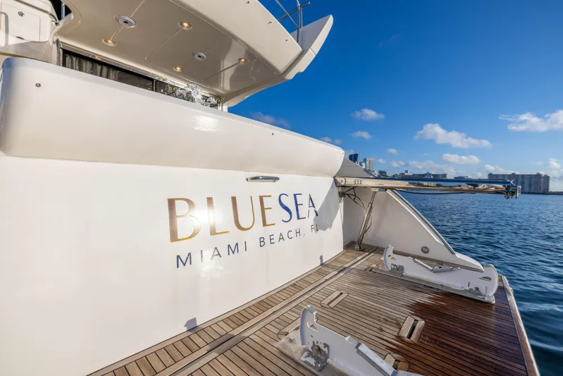 Blue Sea Yacht Photos Pics Azimut 53 yacht, 2012 model, docked in Miami Beach with "BLUE SEA" branding.