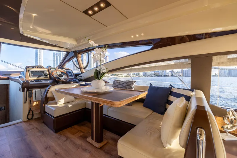 Blue Sea Yacht Photos Pics Luxurious interior of 2012 Azimut 53 yacht with elegant seating and scenic views.