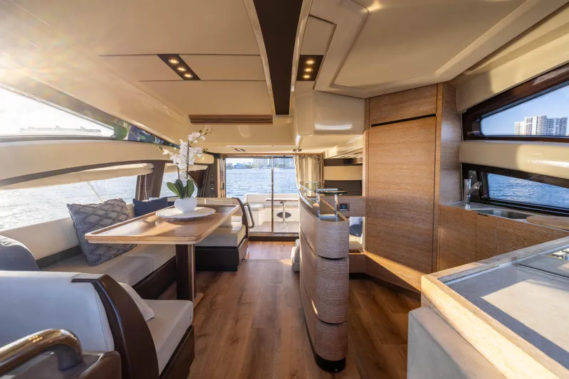 Blue Sea Yacht Photos Pics Luxurious interior of 2012 Azimut 53 yacht with elegant wood finishes and modern design.