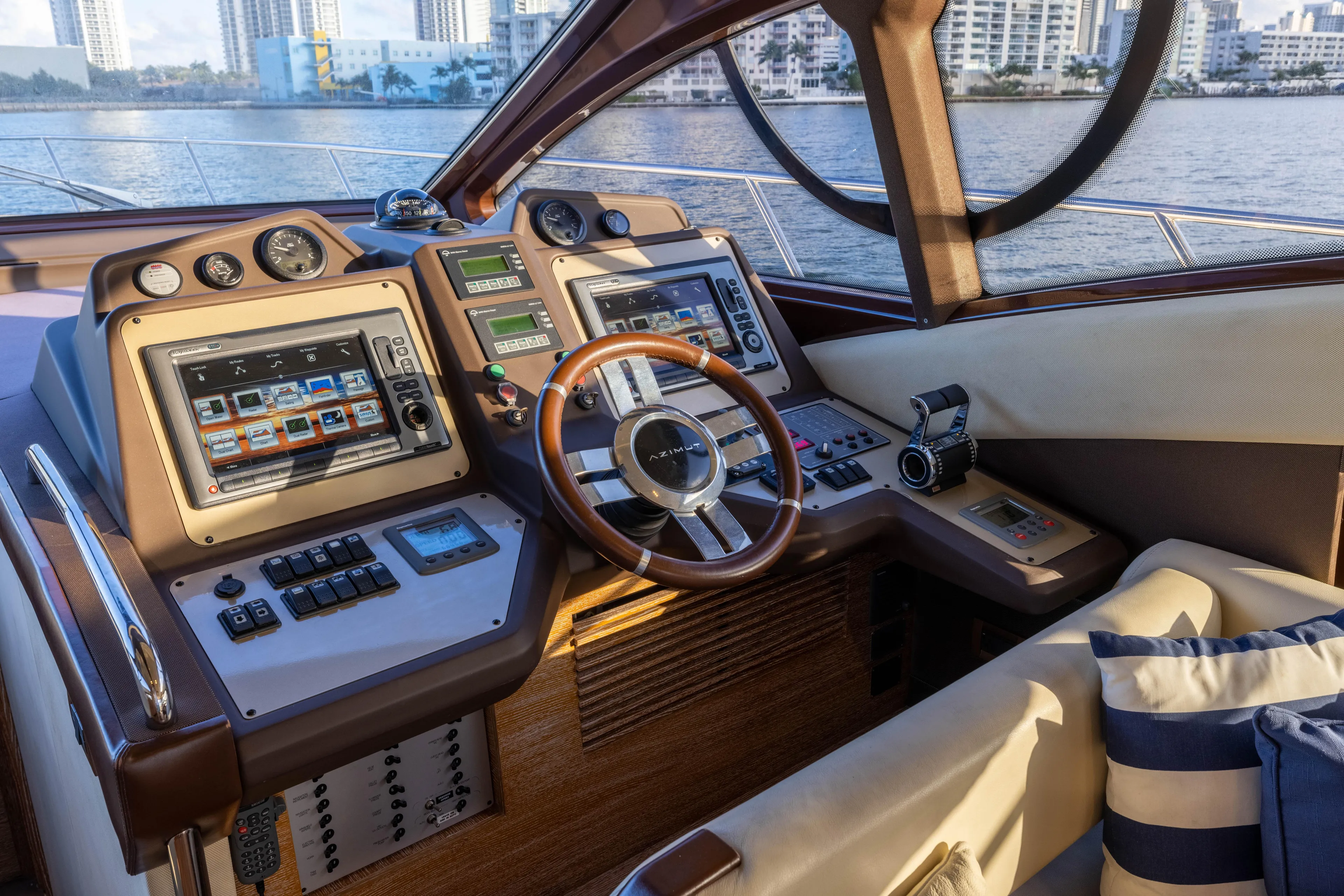 Blue Sea Yacht Photos Pics Luxurious 2012 Azimut 53 yacht cockpit with advanced navigation systems and waterfront view.