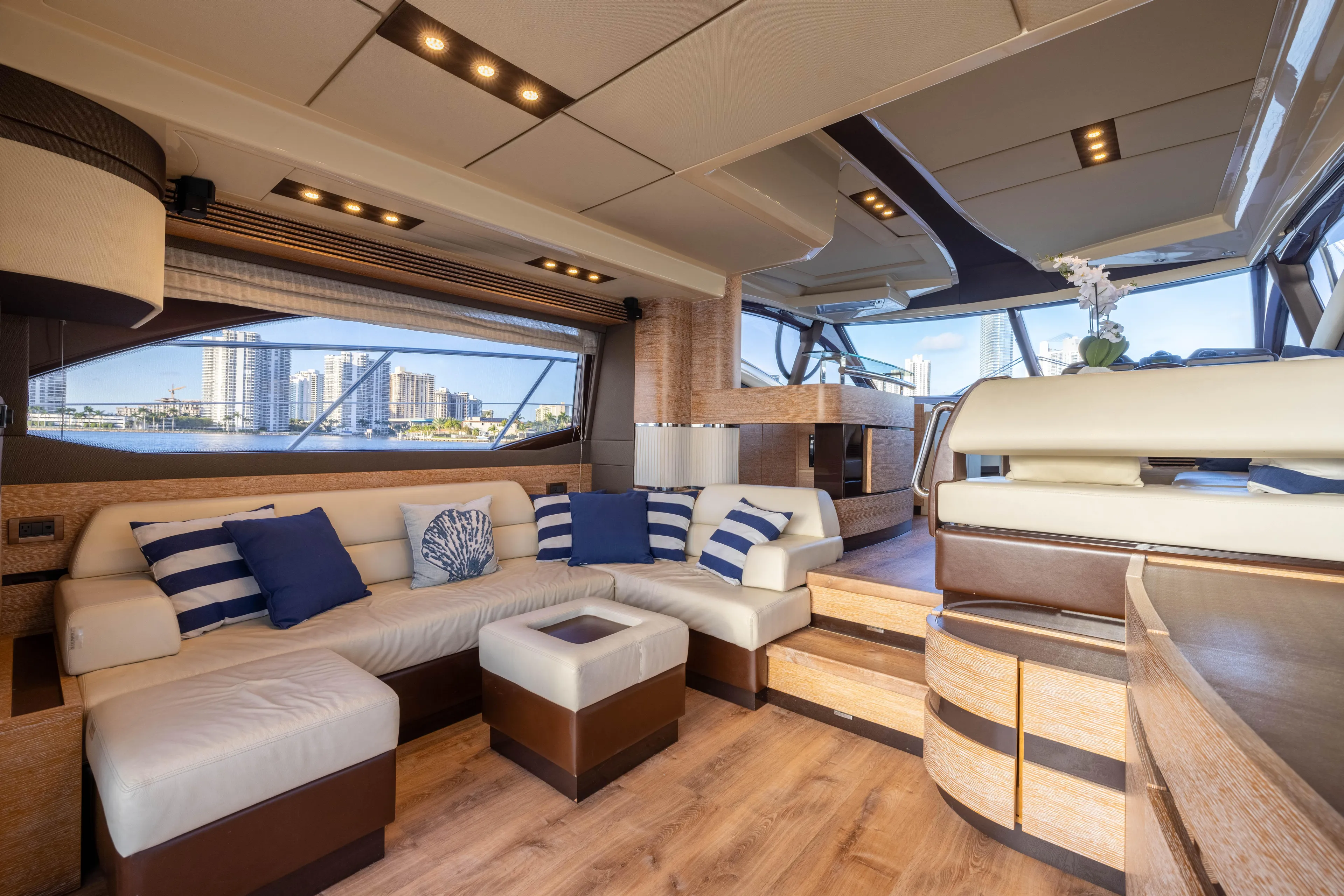 Blue Sea Yacht Photos Pics Luxurious interior of a 2012 Azimut 53 yacht with modern furnishings and scenic views.