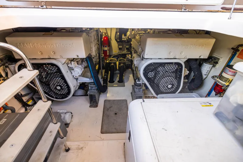 Blue Sea Yacht Photos Pics Engine room of a 2012 Azimut 53 yacht, featuring dual MAN engines.