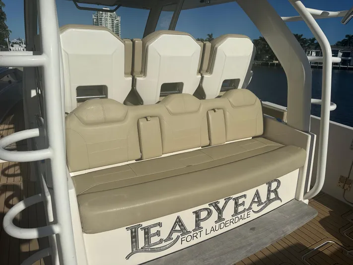 Leap Year Yacht Photos Pics Pursuit 408S 2018 boat seating with "Leap Year" Fort Lauderdale branding.
