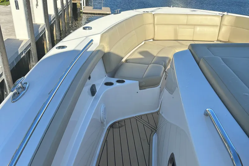 Leap Year Yacht Photos Pics 2018 Pursuit 408S boat with beige seating and sleek design.