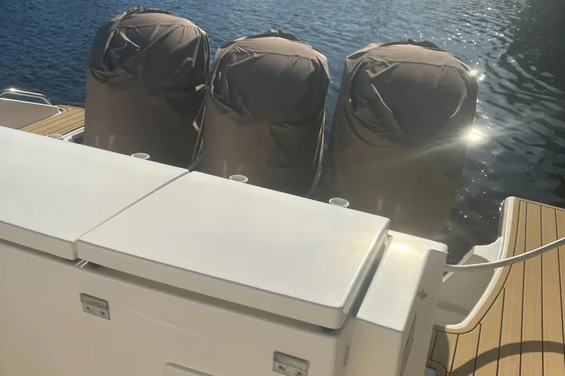 Leap Year Yacht Photos Pics 2018 Pursuit 408S boat with triple covered engines on water.