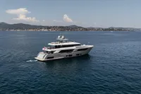 Luxurious 2022 Custom Line 37 yacht cruising on serene blue waters.