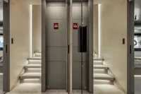 Modern yacht interior with illuminated stairs, Custom Line 37, 2022 model.