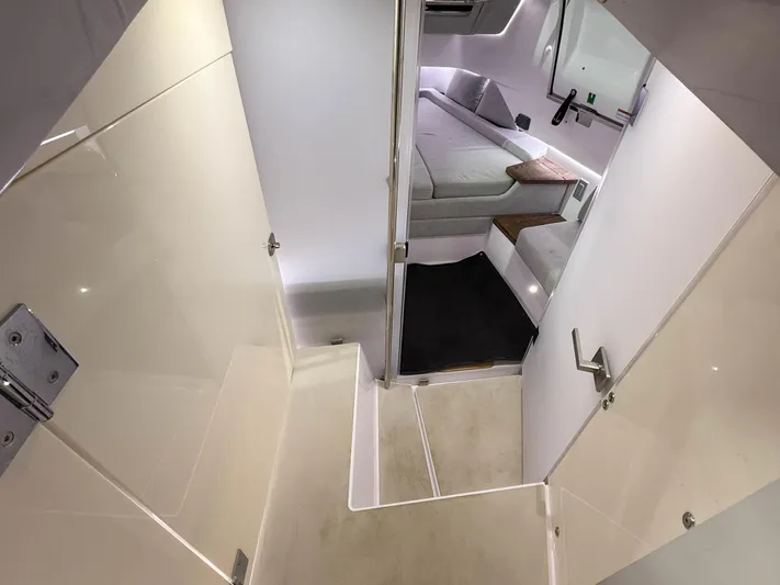  Yacht Photos Pics Interior of 2021 Axopar 37 XC CROSS CABIN, featuring modern seating and sleek design.