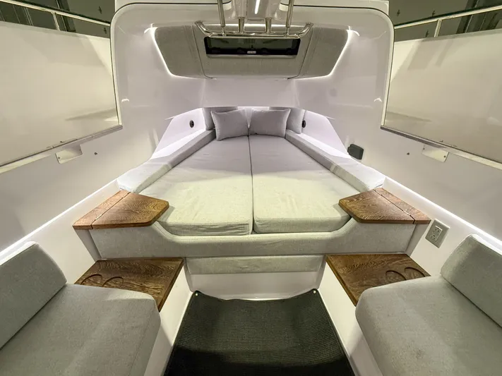  Yacht Photos Pics 2021 Axopar 37 XC CROSS CABIN interior with cozy bed and modern design.