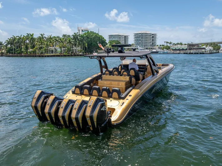 Perla Bianca II Yacht Photos Pics 2023 Midnight Express 43 Open boat with multiple engines cruising on a sunny day.