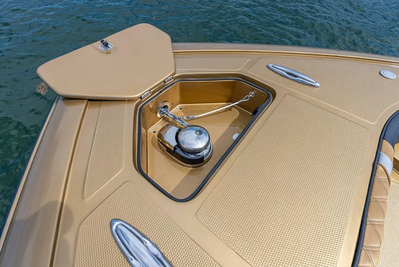 Perla Bianca II Yacht Photos Pics 2023 Midnight Express 43 Open boat anchor compartment, featuring sleek design and metallic finish.