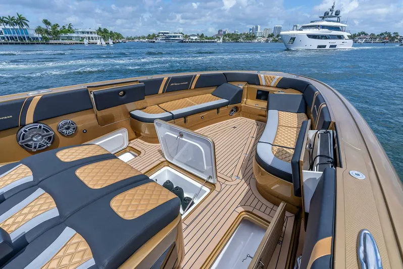 Perla Bianca II Yacht Photos Pics Luxurious 2023 Midnight Express 43 Open boat interior with elegant seating and ocean view.