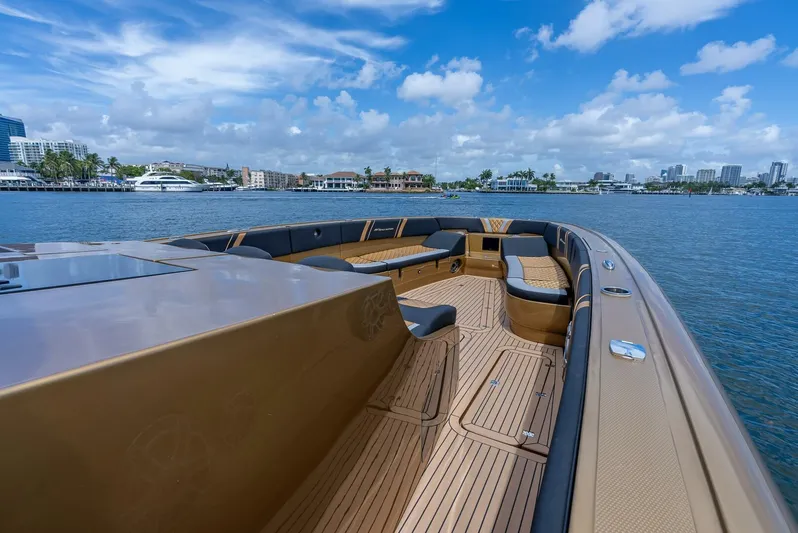 Perla Bianca II Yacht Photos Pics 2023 Midnight Express 43 Open yacht with luxurious seating on a sunny day.