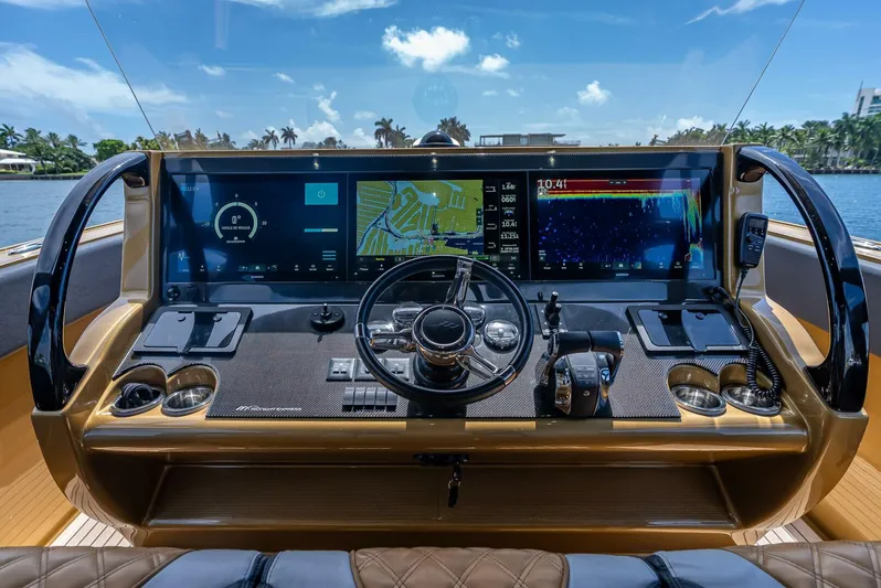 Perla Bianca II Yacht Photos Pics 2023 Midnight Express 43 Open yacht dashboard with advanced navigation and control systems.