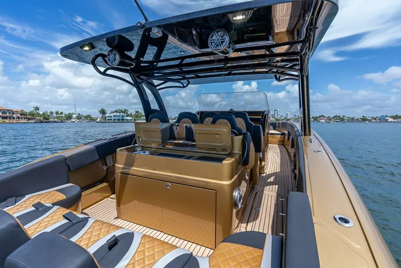 Perla Bianca II Yacht Photos Pics 2023 Midnight Express 43 Open luxury boat interior with sleek design and waterfront view.