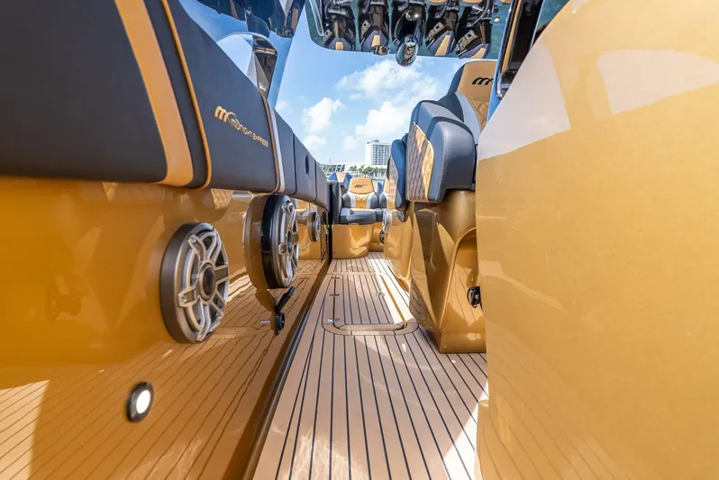 Perla Bianca II Yacht Photos Pics 2023 Midnight Express 43 Open boat interior with luxurious seating and sleek design.