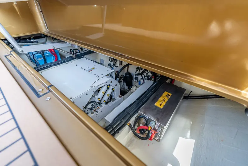 Perla Bianca II Yacht Photos Pics Engine compartment of 2023 Midnight Express 43 Open boat, showcasing advanced machinery and components.