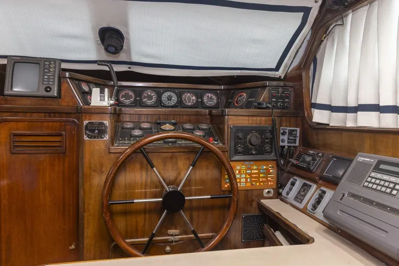  Yacht Photos Pics Cockpit of 1982 Benetti Sail Division 16m Motorsailer with vintage navigation instruments.