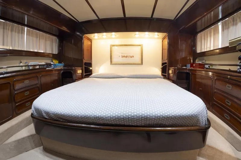  Yacht Photos Pics Luxurious bedroom interior of 1982 Benetti Sail Division 16m Motorsailer yacht.