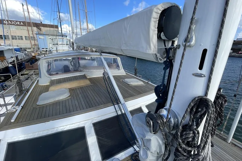  Yacht Photos Pics 1982 Benetti Sail Division 16m Motorsailer docked, showcasing deck and rigging.