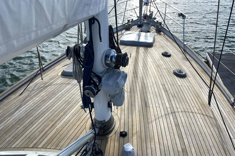  Yacht Photos Pics Deck of 1982 Benetti Sail Division 16m Motorsailer with wooden finish and rigging details.