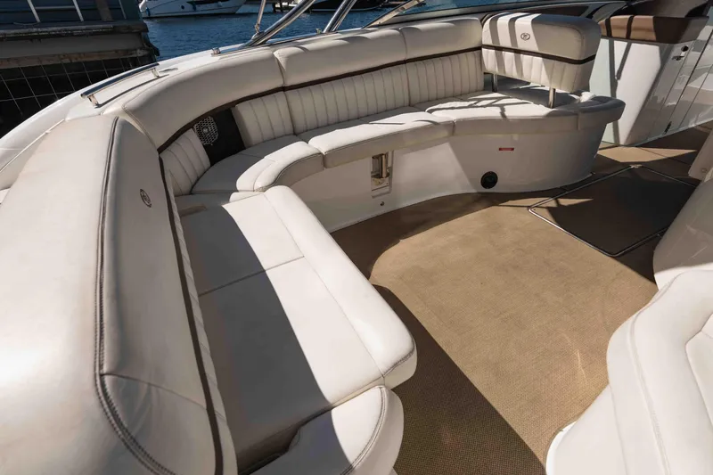  Yacht Photos Pics Luxurious seating area on a 2013 Cobalt 336 boat, featuring cream upholstery.