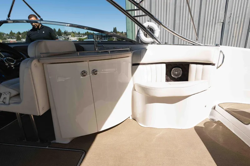  Yacht Photos Pics 2013 Cobalt 336 boat interior with seating and storage cabinets.