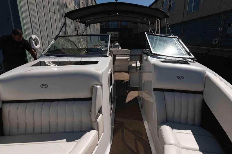  Yacht Photos Pics 2013 Cobalt 336 boat with white leather seating and sleek design.