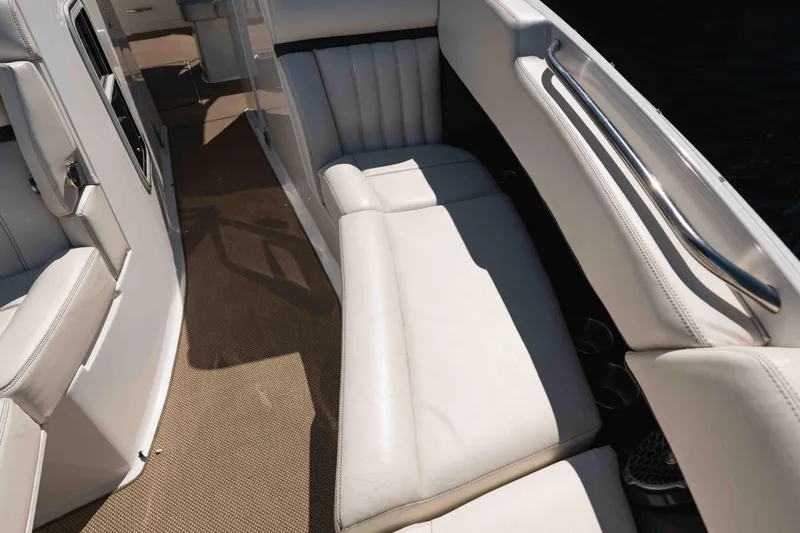  Yacht Photos Pics Interior of a 2013 Cobalt 336 boat with white leather seating.