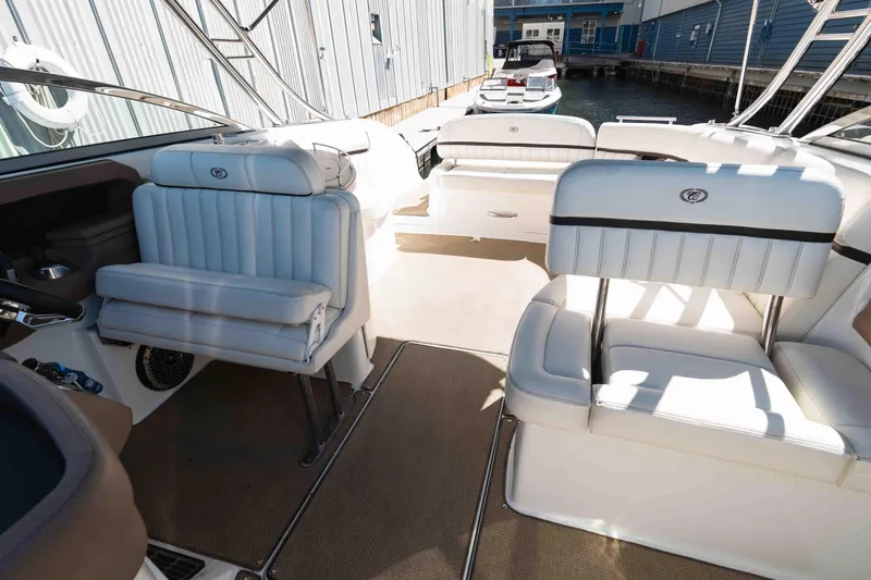  Yacht Photos Pics Interior of a 2013 Cobalt 336 boat with white seating and modern design.