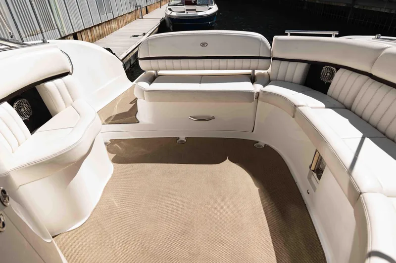  Yacht Photos Pics Luxurious interior of a 2013 Cobalt 336 boat with plush white seating.