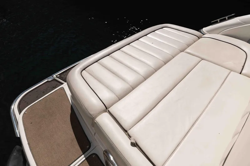  Yacht Photos Pics 2013 Cobalt 336 boat with beige leather seating and deck, close-up view.